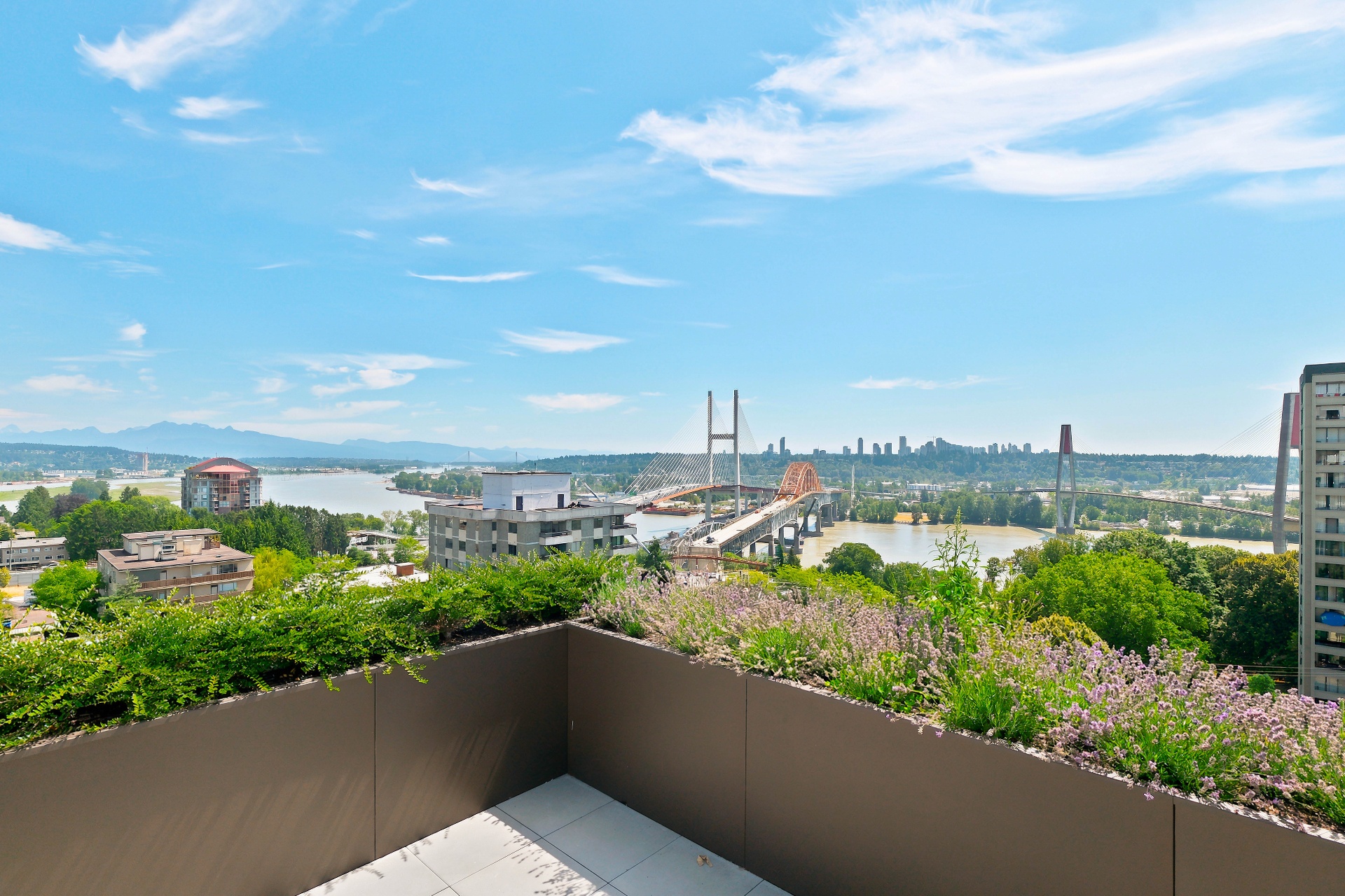 First & Royal rooftop amenity with Fraser River views, New Westminster